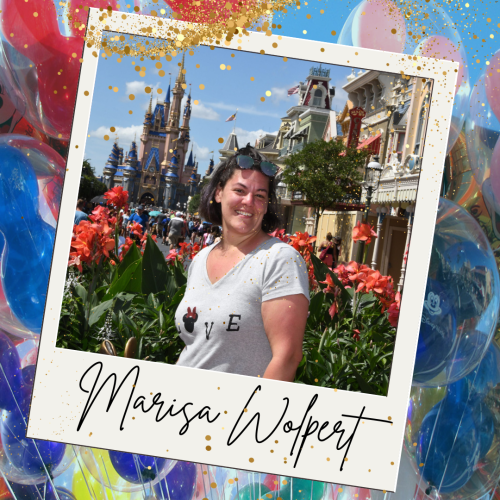 Experienced Travel Agent Marisa Wolpert poses on Main Street, U.S.A. at Disney's Magic Kingdom.